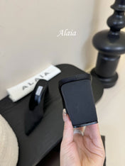 ALAIA HIGH MULES 25S IN BLACK SATIN
