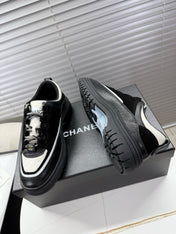 CHANEL 25S SNEAKERS 35MM IN BLACK AND WHITE CALFSKIN