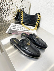 PRADA 26S MULE LOAFERS IN BLACK CALFSKIN WITH LOGO