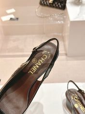 SLINGBACKS IN BLACK SHEEPSKIN