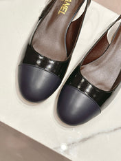 SLINGBACKS IN BLACK SHEEPSKIN