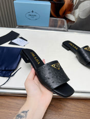 PRA SAFFIANO PATENT SLIDES OSTRICH MOTIF BLACK CALFSKIN