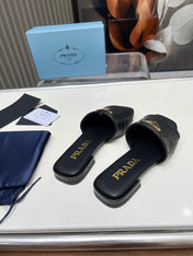 PRA SAFFIANO PATENT SLIDES OSTRICH MOTIF BLACK CALFSKIN