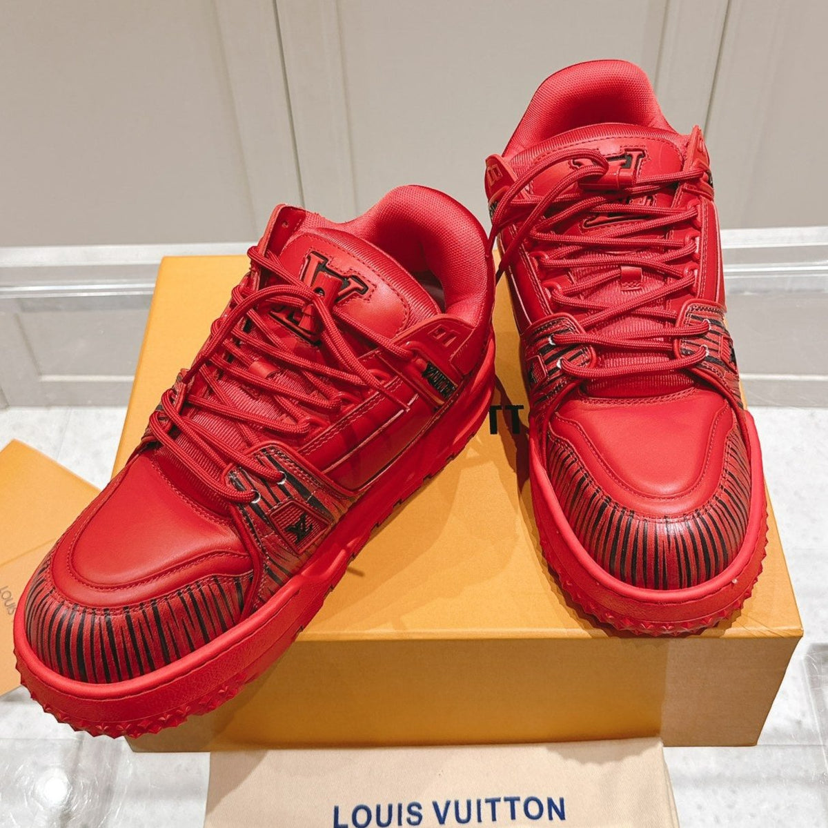LV TRAINER MAXI LV X PARK SEO-BO IN RUBY RED CALFSKIN
