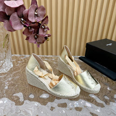 SL WEDGE SANDALS METALLIC GOLD CALFSKIN AND STRAW