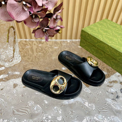 WOMEN'S SLIPPER IN BLACK CALFSKIN WITH GOLD HARDWARE