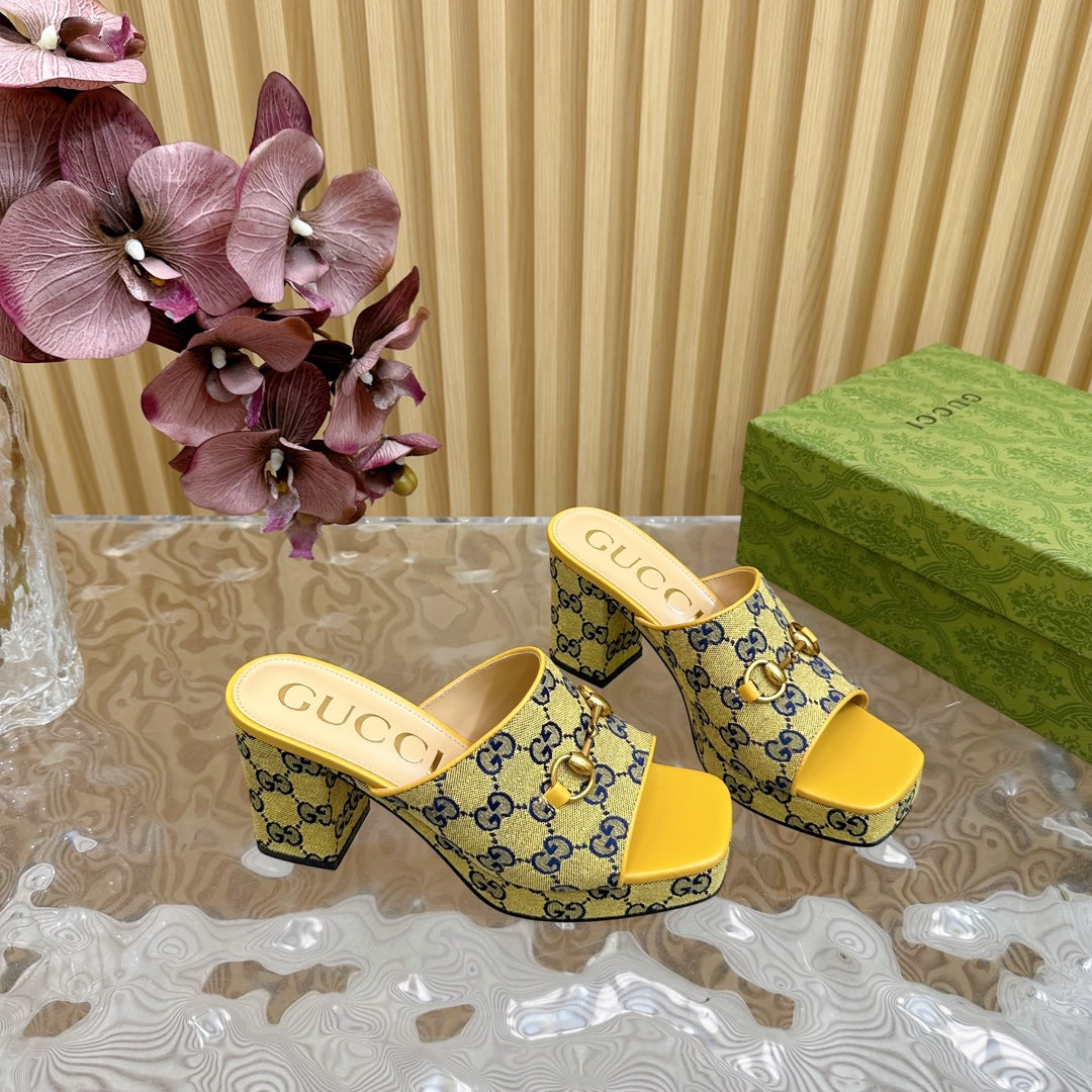 HORSEBIT SLIDE SANDAL IN TUSCANY YELLOW MONOGRAM CANVAS AND SHEEPSKIN LINING