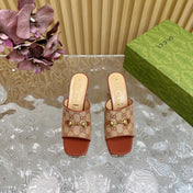 HORSEBIT SLIDE SANDAL IN BRONZE ORANGE MONOGRAM CANVAS AND SHEEPSKIN LINING