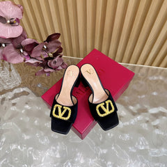 VALENTINO 25S HIGH-HEEL MULES 60 MM IN BLACK VELVET AND CALFSKIN WITH GOLD HARDWARE