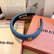 THICK HEADBAND IN AZURE BLUE DENIM GOLD LOGO 425464