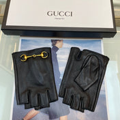 FINGERLESS GLOVES IN BLACK LAMBSKIN WITH GOLD HORSEBIT 432606