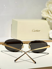 C DE RIMLESS ROUND FRAME SUNGLASSES CT0611S IN METAL