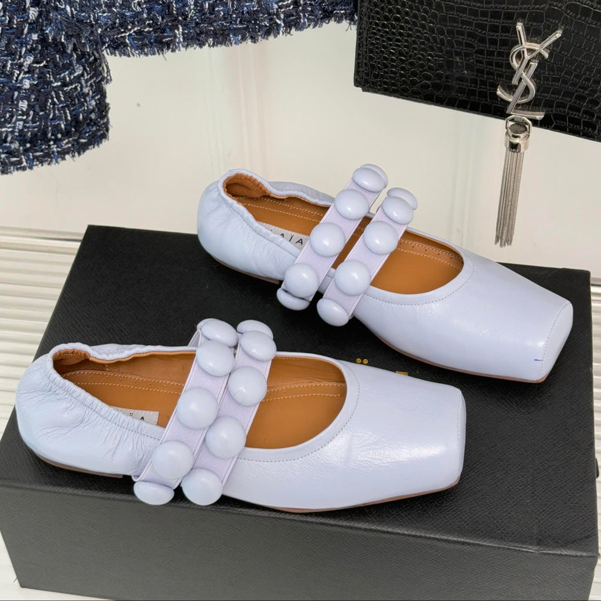 ALAIA MARY JANE PEARL IN PALE PURPLE GLOSSY LAMBSKIN