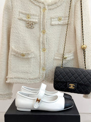 FLAT SHOES IN BLACK AND WHITE LAMBSKIN GOLD HARDWARE