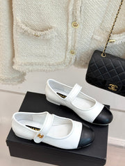FLAT SHOES IN BLACK AND WHITE LAMBSKIN GOLD HARDWARE