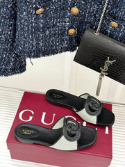 SLIDE SANDALS IN BLACK AND WHITE CALFSKIN