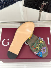 SLIDE SANDALS IN WARM BEIGE FABRIC FLORAL AND LEAF PRINT