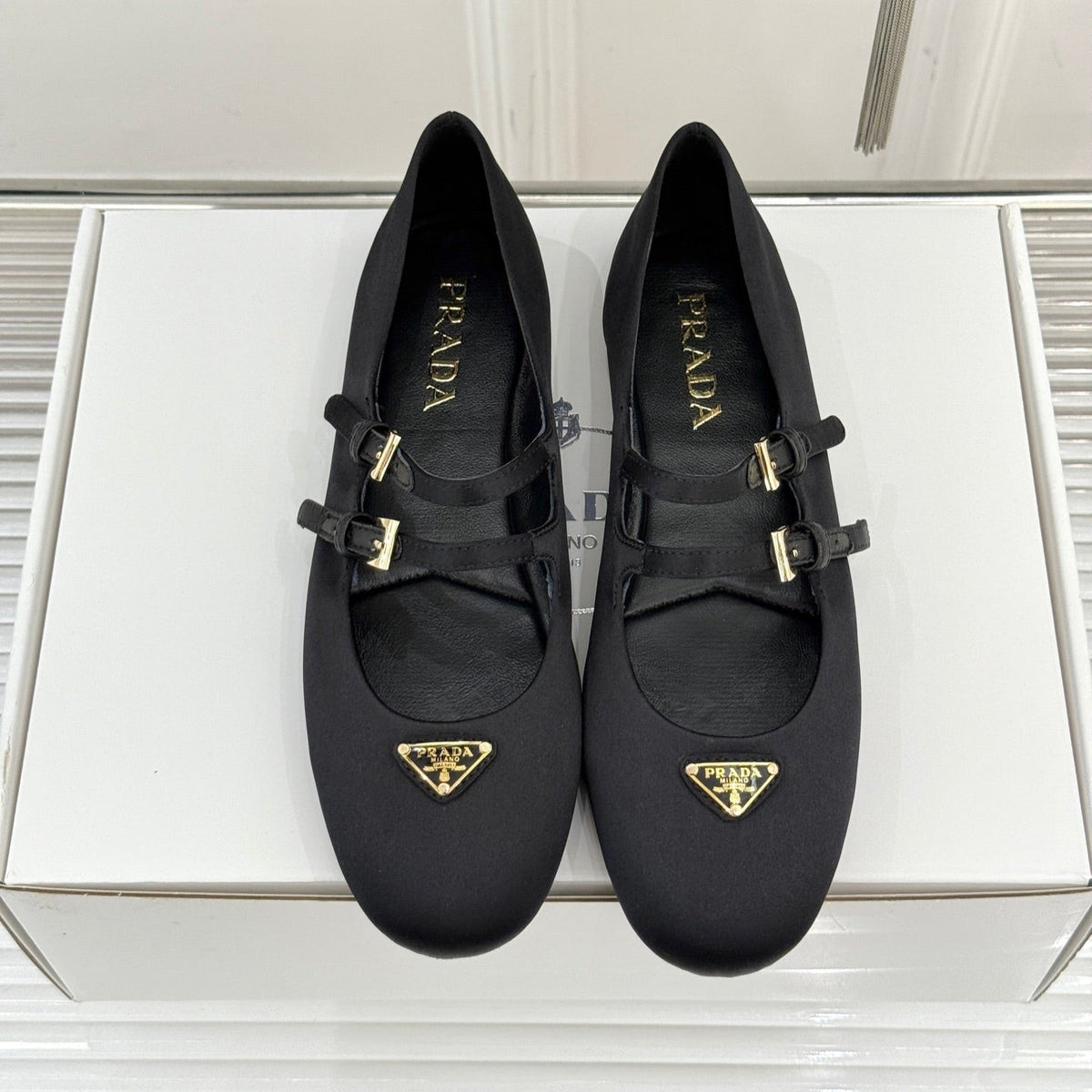 PRADA 25S DOUBLE STRAP BALLERINAS IN BLACK SATIN