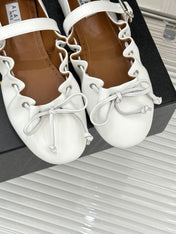 ALAIA 26S MARY JANE FLATS IN WHITE LAMBSKIN WITH BOW