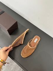 ALAIA FLAT MULES IN COPPER BROWN MESH FISHNET