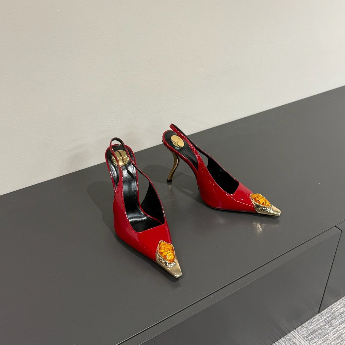 ORANGE GEM-STUDDED SLINGBACK PUMPS IN RED PATENT CALFSKIN