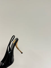 GREEN GEM-STUDDED SLINGBACK PUMPS IN BLACK PATENT CALFSKIN