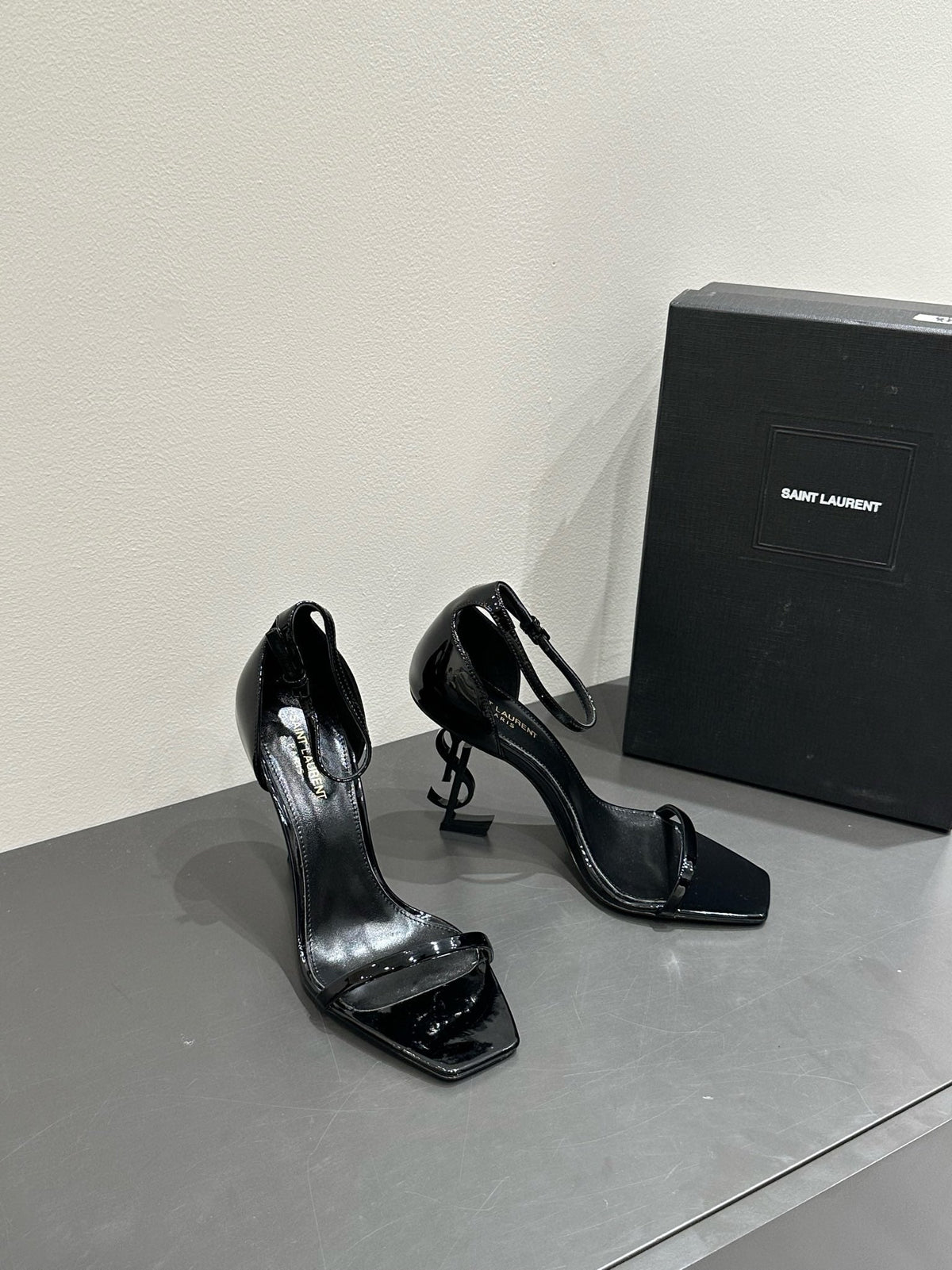 YSL HEELED SANDALS 25S 105 MM IN BLACK GLOSSY LAMBSKIN