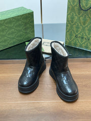 GG UGG BOOTS IN BLACK EMBOSSED SUEDE AND BEIGE WOOL LINING