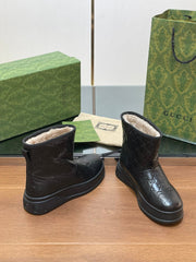 GG UGG BOOTS IN BLACK EMBOSSED DEERSKIN AND BEIGE WOOL LINING