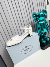 PRADA 26S ANKLE STRAP PUMPS 40MM IN WHITE PATENT CALFSKIN TRIANGLE LOGO
