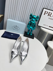 HIGH POINTED-TOE PUMPS IN SILVER GLOSSY CALFSKIN