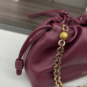 LOE MEDIUM 30 FLAMENCO PURSE BUCKET IN PLUM PURPLE LAMBSKIN