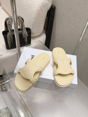 CELINE 26S TRIOMPHE SLIDES IN PASTEL YELLOW CALFSKIN
