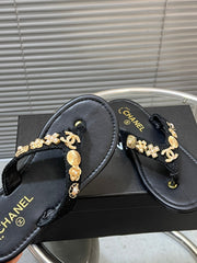 THONG SLIPPERS IN BLACK SOFT LEATHER WITH LOGO STICKER DETAIL