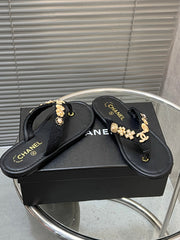 THONG SLIPPERS IN BLACK SOFT LEATHER WITH LOGO STICKER DETAIL