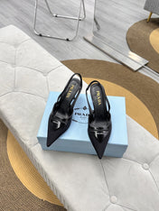 PRADA 25S TRIANGLE LOGO SLINGBACK PUMPS IN BLACK MESH FABRIC