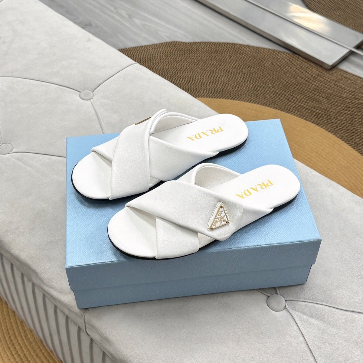 PRADA 25S SLIDE SANDALS IN WHITE CALFSKIN LOGO