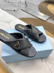 PRADA 25S SLIDE SANDALS IN BLACK CALFSKIN LOGO