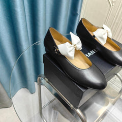 MARY JANE SHOES BLACK SHEEPSKIN WITH WHITE BOW