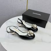 CHANEL 26S CAMELLIA PEARL SLINGBACKS IN BLACK CALFSKIN