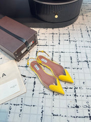 ALAIA FLAT SLINGBACK IN YELLOW PATENT CALFSKIN AND FILM
