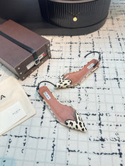 ALAIA FLAT SLINGBACK IN BLACK MIX WHITE PATENT CALFSKIN AND FILM