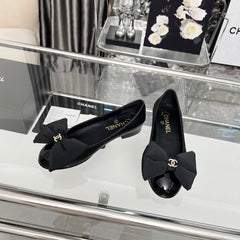 CHANEL 25S ROUND TOE BALLET FLATS WITH A BOW IN BLACK CALFSKIN
