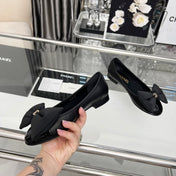 CHANEL 25S ROUND TOE BALLET FLATS WITH A BOW IN BLACK CALFSKIN