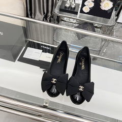 CHANEL 25S ROUND TOE BALLET FLATS WITH A BOW IN BLACK CALFSKIN
