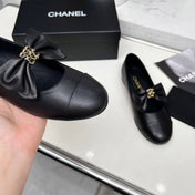 CHANEL 25S MARY JANES IN BLACK CALFSKIN WITH BOW GOLD HARDWARE