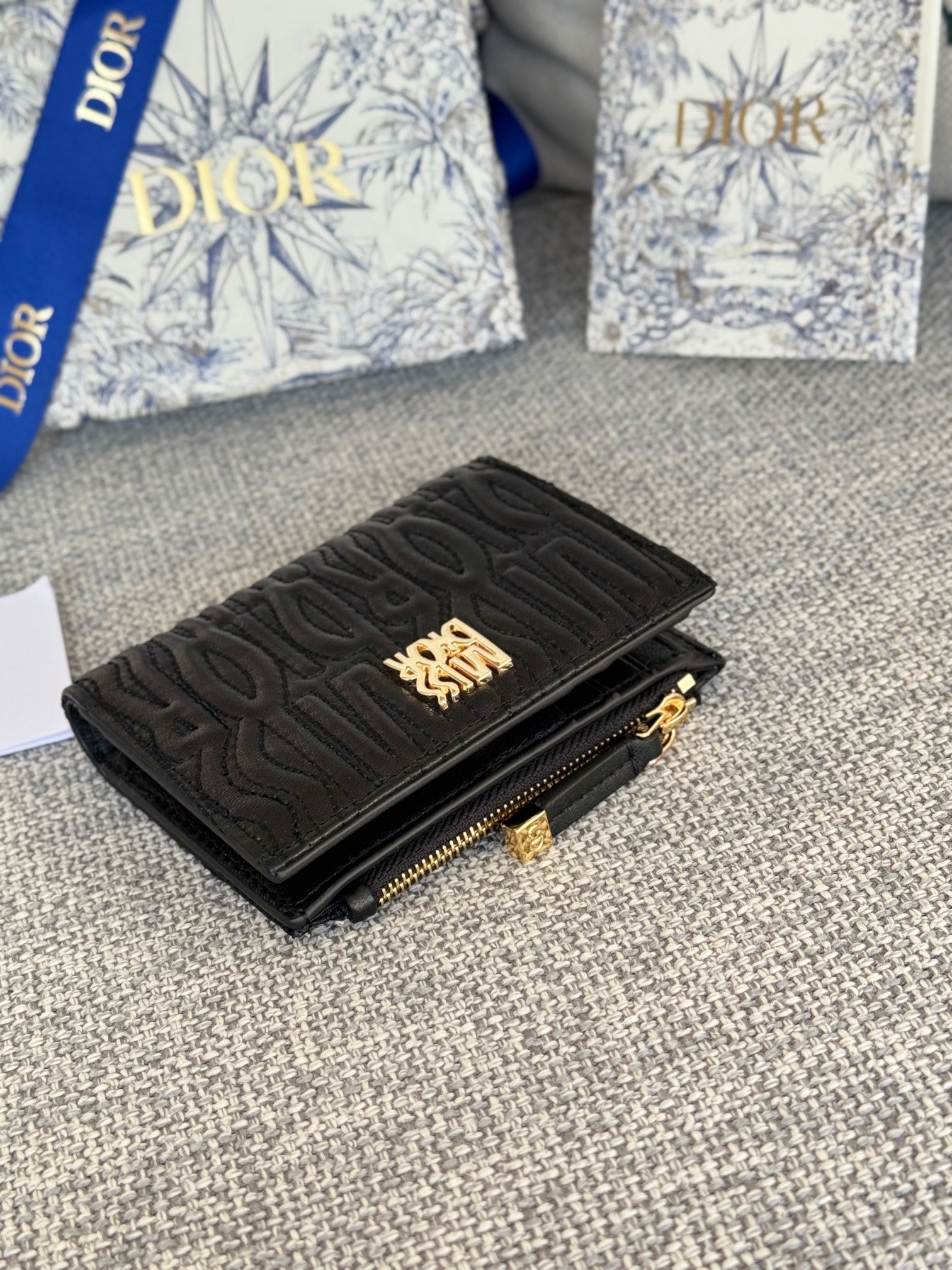 BIFOLD WALLET 11 IN BLACK QUILTED ALLOVER CALFSKIN