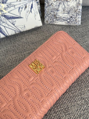 VERTICAL LONG ZIP WALLET 20 IN BABY PINK QUILTED ALLOVER CALFSKIN