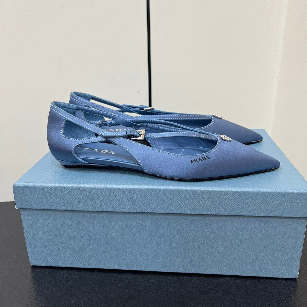 CUT-OUT BALLERINA FLAT IN PERANO BLUE SATIN ATTACHED BEAD BUCKLE