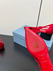 CUT-OUT PUMPS WITH BEAD BUCKLE IN CLASSIC RED SATIN